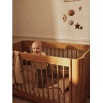 Ferm Living Tilu baby cot, natural oak, decoration image