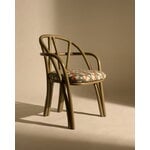 GUBI Bistra dining armchair, olive stained rattan - Reales Pattern 001, decoration image