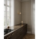 Nuura Asteea portable table lamp, satin brass - ripple clear, decoration image