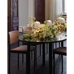 Nuura Asteea portable table lamp, satin brass - ripple clear, decoration image