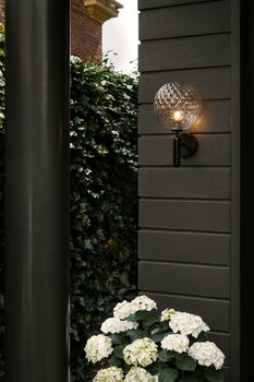 Nuura Miira Outdoor wall lamp, black - optic clear