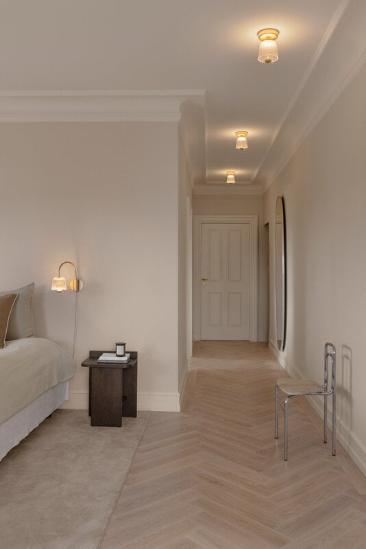 Nuura Asteea ceiling lamp, satin brass - ripple clear, decoration image