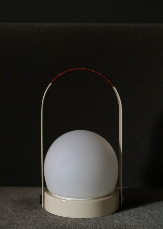 Audo Copenhagen Carrie portable table lamp, Anniv. Ed., IP44, steel, ivory - leather, decoration image