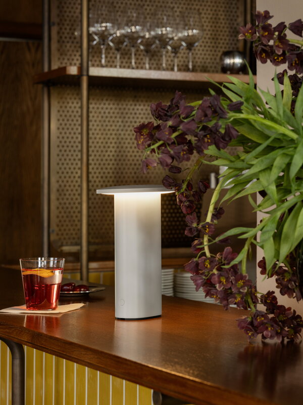 Fritz Hansen Solae portable lamp, warm grey, decoration image