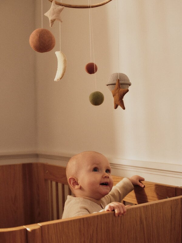Ferm Living Tilu baby cot, natural oak, decoration image
