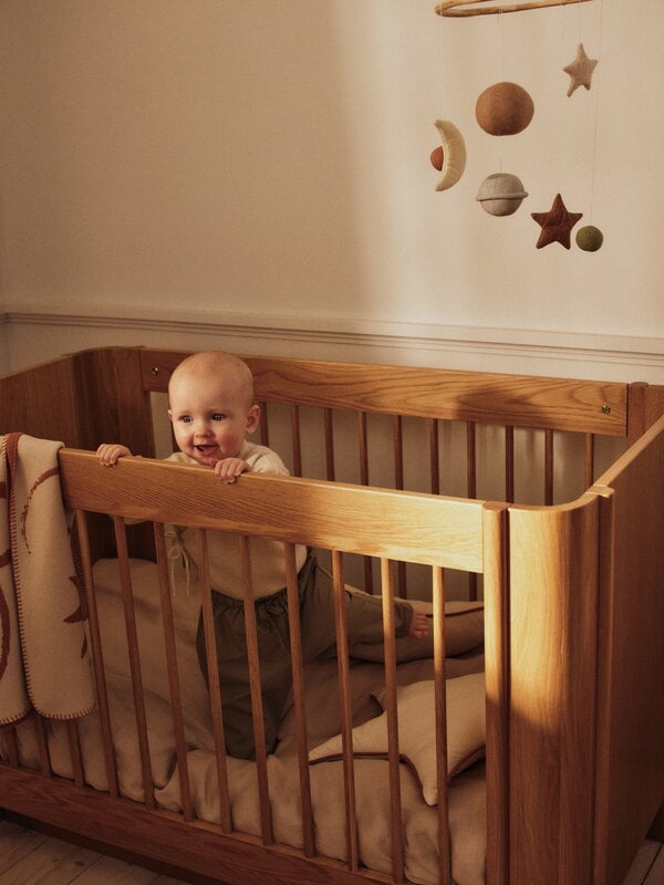 Ferm Living Tilu baby cot, natural oak, decoration image