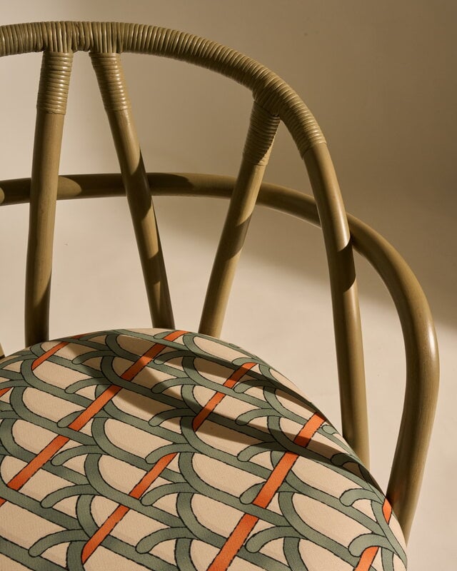 GUBI Bistra dining armchair, olive stained rattan - Reales Pattern 001, decoration image
