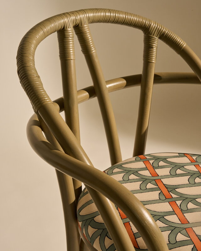 GUBI Bistra dining armchair, olive stained rattan - Reales Pattern 001, decoration image