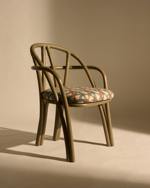 GUBI Bistra dining armchair, olive stained rattan - Reales Pattern 001, decoration image