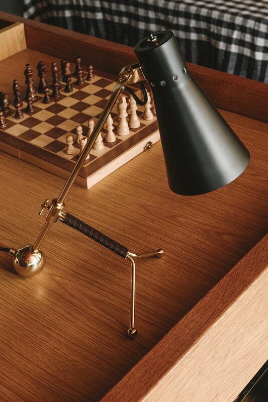 Innolux Tapio table lamp, black - brass, decoration image