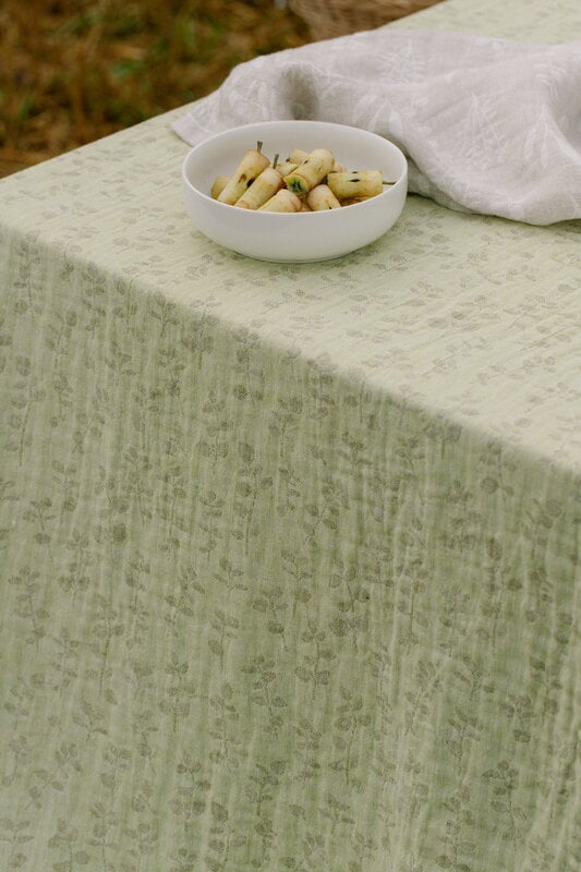 Lapuan Kankurit Meirami table cloth/throw, 145 x 260 cm, lime - olive, decoration image