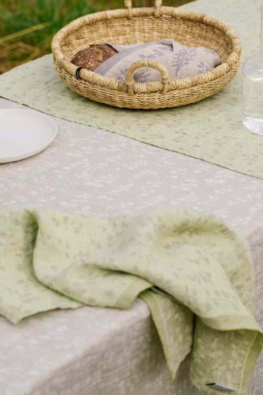 Lapuan Kankurit Meirami table cloth/throw, 145 x 260 cm, lime - olive, decoration image