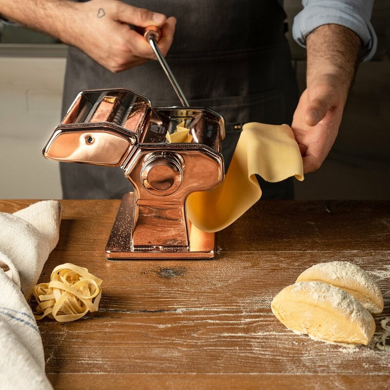 https://media.fds.fi/decor_image/800/marcato-atlas-150-pasta-maker-copper-in-use-borough-kitchen_1296x.jpeg